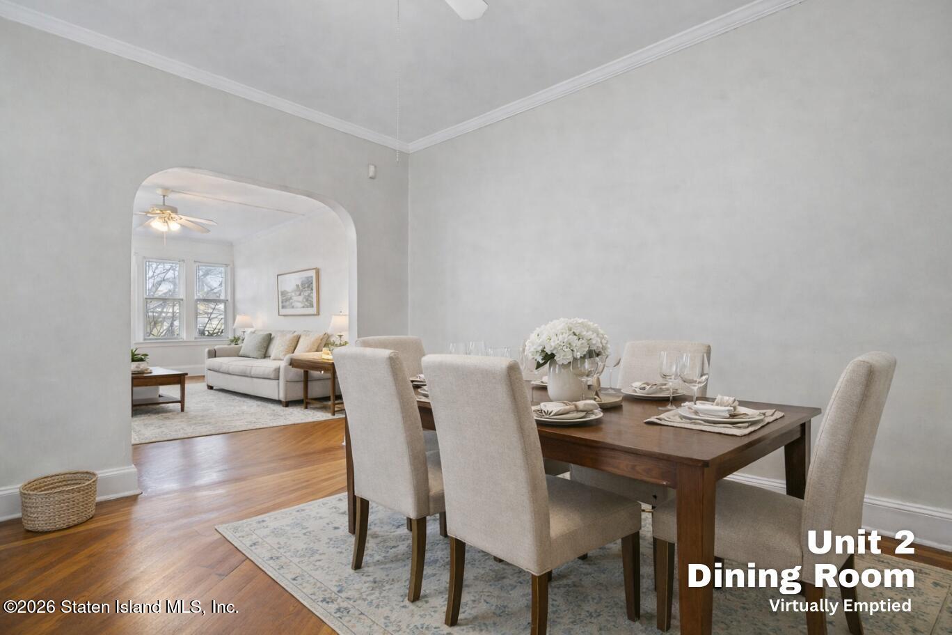 116 Silver Lake Road Staten Island, NY 10301 - Photo 21 of 36 a view of a dining room with furniture and a potted plant
