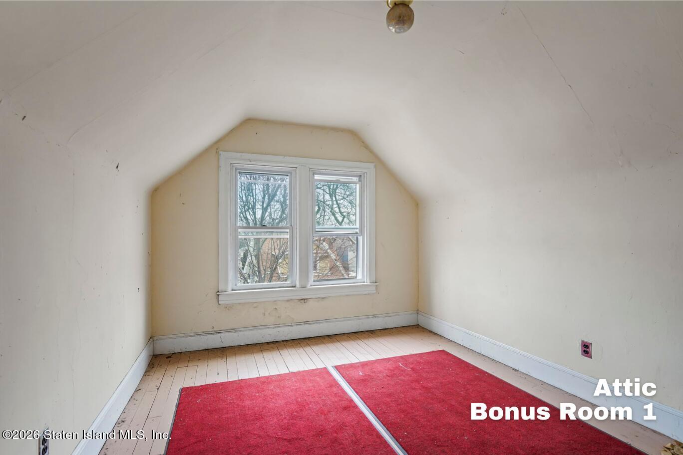 116 Silver Lake Road Staten Island, NY 10301 - Photo 29 of 36 an empty room with windows