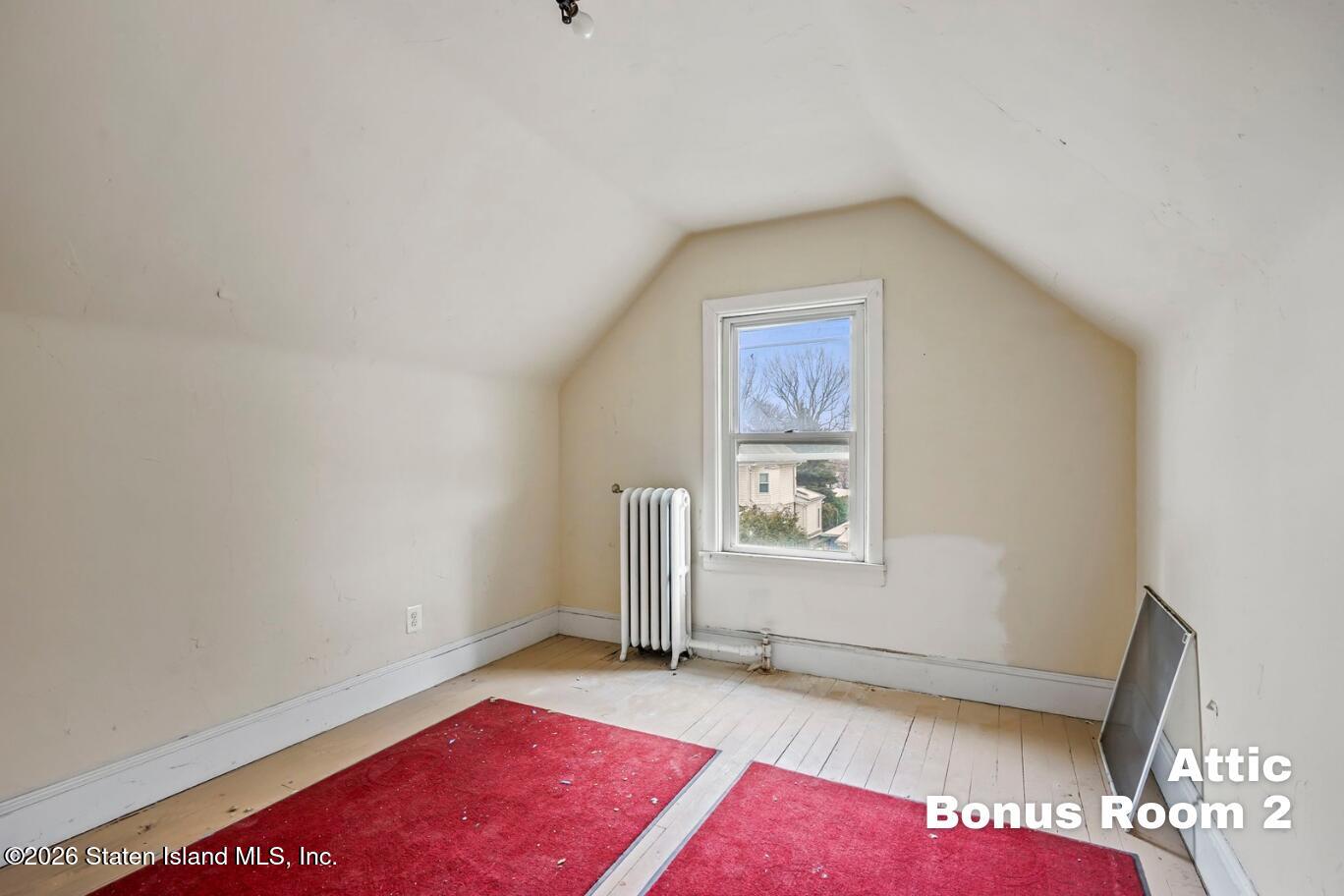 116 Silver Lake Road Staten Island, NY 10301 - Photo 30 of 36 a view of an empty room and window