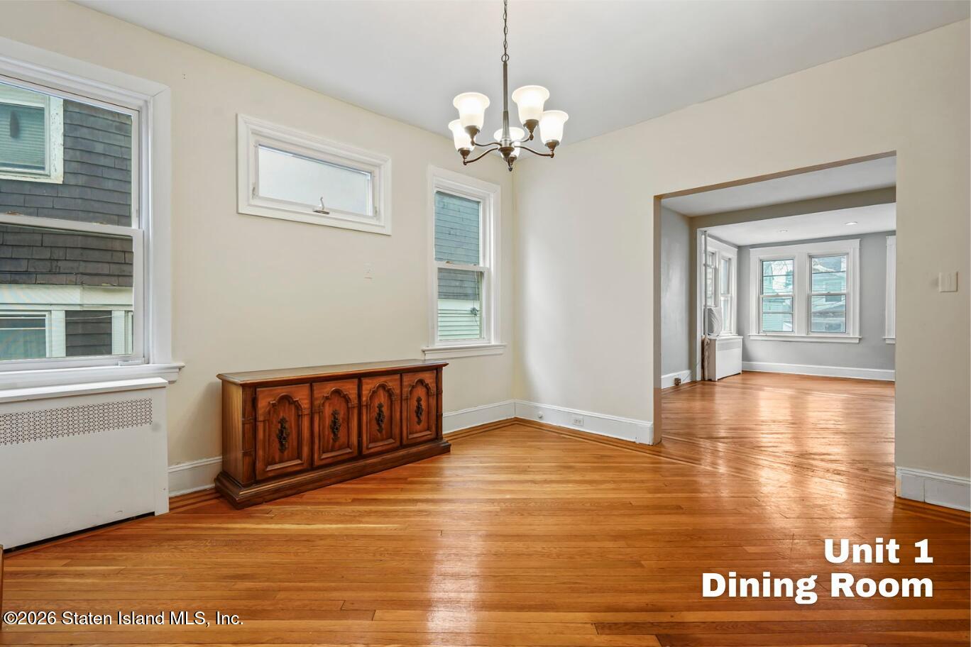 116 Silver Lake Road Staten Island, NY 10301 - Photo 6 of 36 a view of an empty room with window