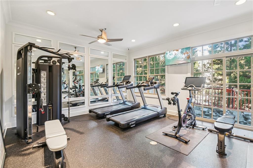 1055 Piedmont Avenue Northeast, Unit 309 Atlanta, GA 30309 - Photo 20 of 23 a view of a room with gym equipment