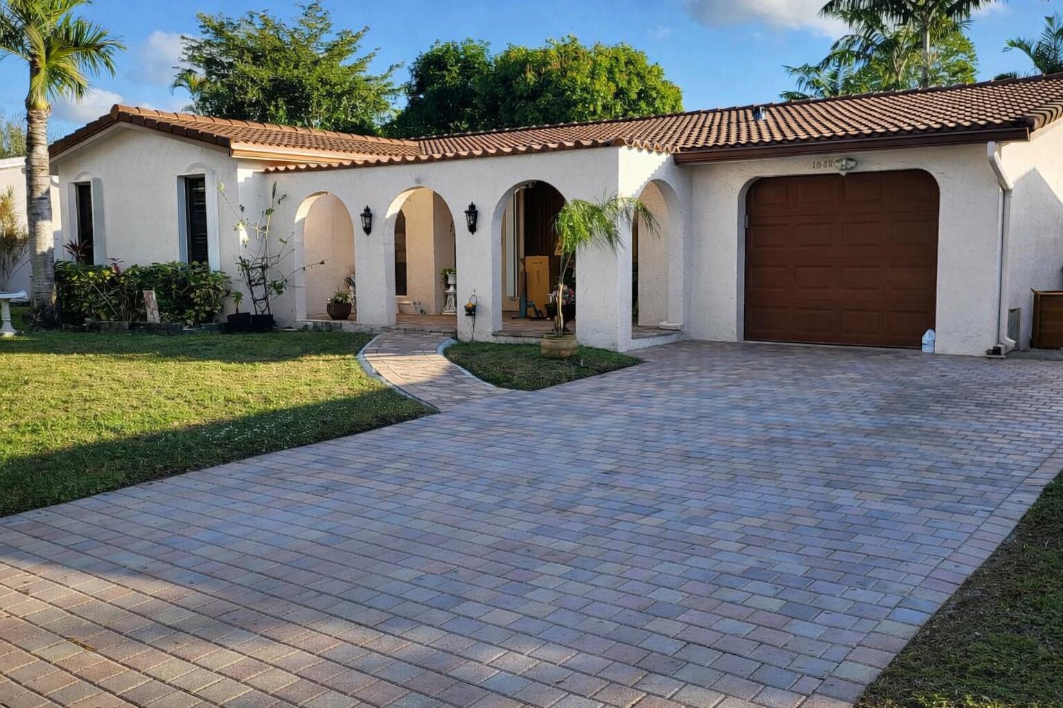 10478 Northwest 4th Street Plantation, FL 33324 - Photo 1 of 3 a view of a house with yard and plants