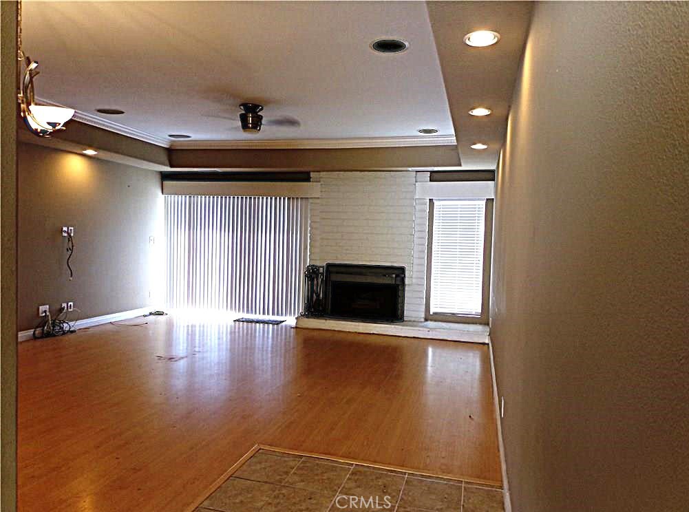 81 Seton Road Irvine, CA 92612 - Photo 11 of 21 Spacious Living room with Fireplace, wired sound,recessed lighing