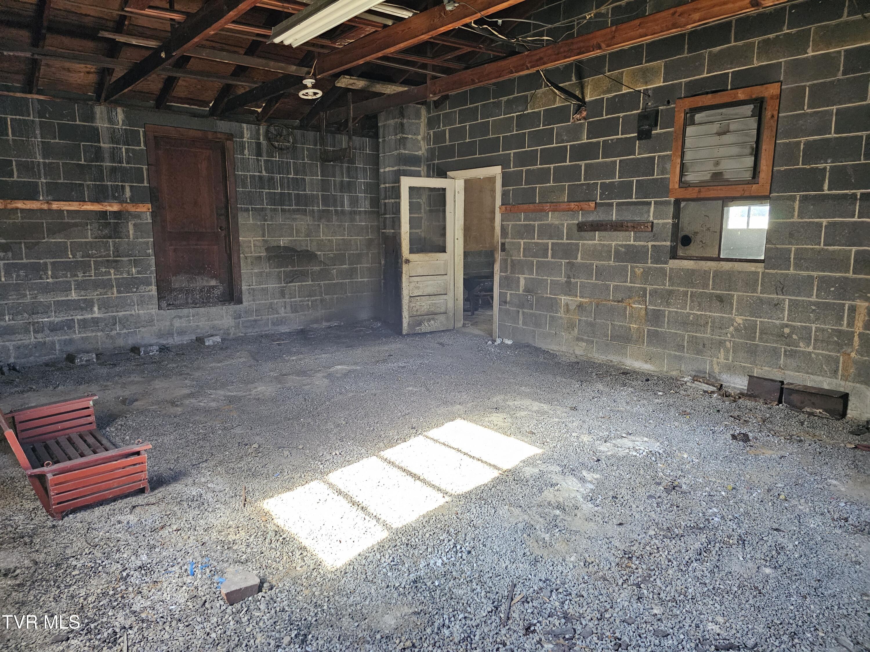 5239 Highway 421 Pennington Gap, VA 24277 - Photo 40 of 45 Left bay back storage