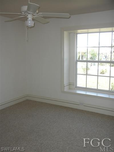 18266 Apple Road Fort Myers, FL 33967 - Photo 7 of 10 an empty room with a window