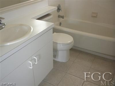 18266 Apple Road Fort Myers, FL 33967 - Photo 8 of 10 a bathroom with a toilet and a bathtub