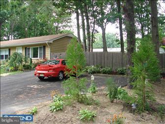 294 Jones Kane Road Williamstown, NJ 08094 - Photo 2 of 6 a front view of a house with garden