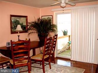 294 Jones Kane Road Williamstown, NJ 08094 - Photo 3 of 6 a view of a room with a large window and wooden floor