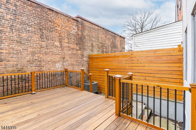 16 Eagles Street Newark, NJ 07102 - Photo 26 of 35 a view of a balcony with wooden floor