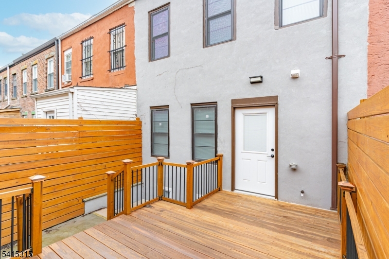 16 Eagles Street Newark, NJ 07102 - Photo 29 of 35 a view of a brick house with an outdoor space