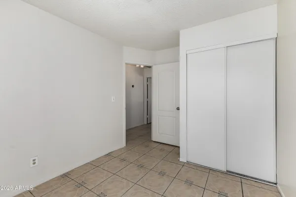 a bathroom with a sink mirror toilet and bathtub