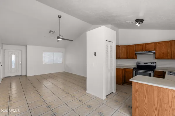 a view of an empty room and window