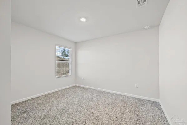 a view of a room with a wardrobe space