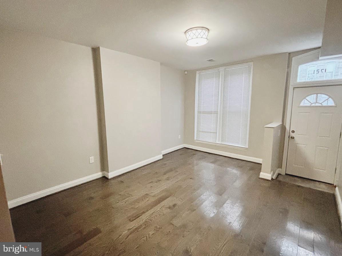 1721 North Bond Street Baltimore, MD 21213 - Photo 2 of 21 an empty room with a door