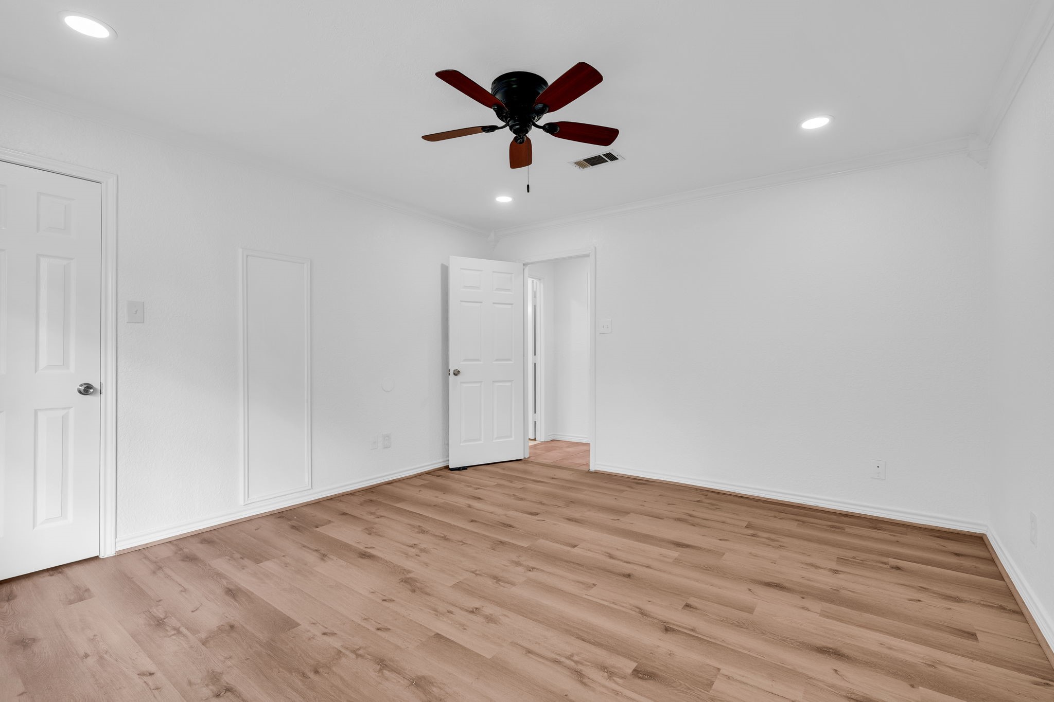 19811 Sagging Oaks Drive Spring, TX 77388 - Photo 25 of 35 a view of an empty room with wooden floor