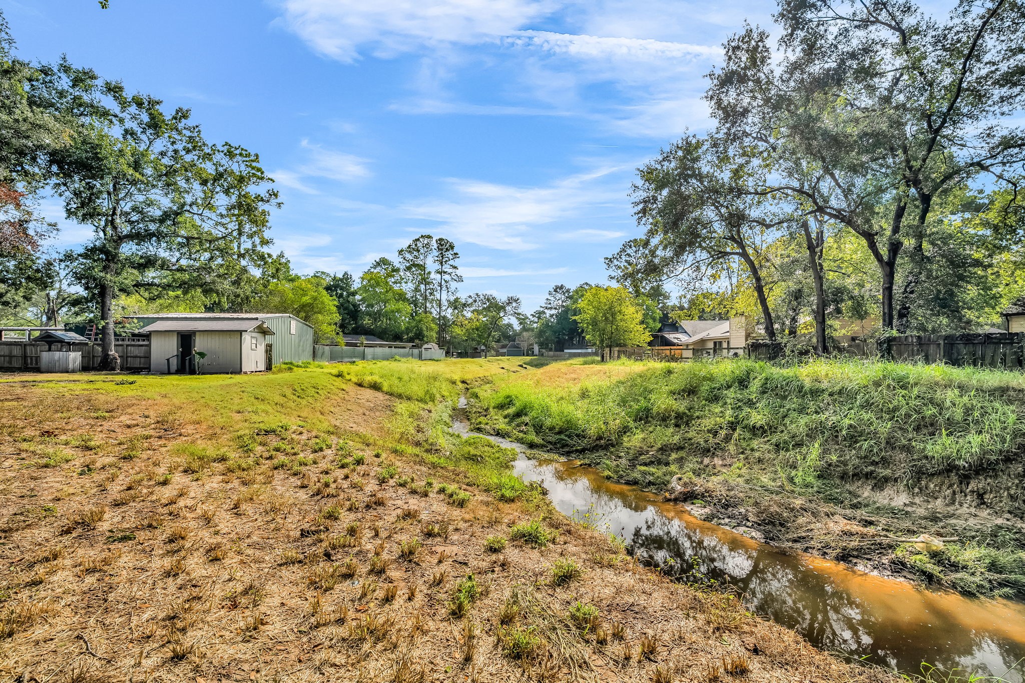 19811 Sagging Oaks Drive Spring, TX 77388 - Photo 32 of 35 a front view of a house with a yard