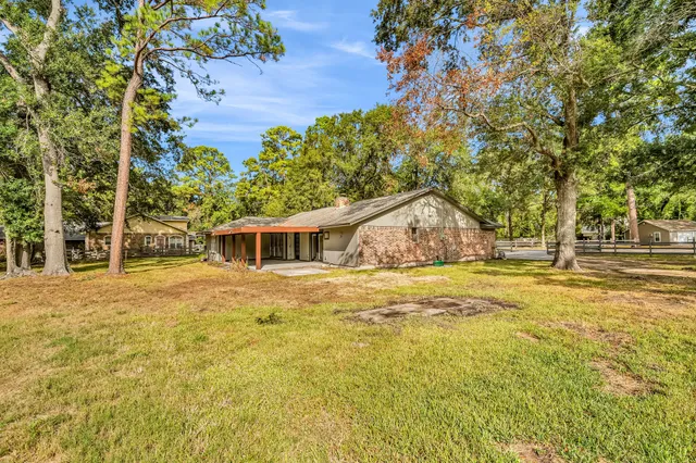 a house with trees in front of it