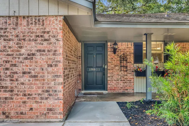 a front view of a house with a garage