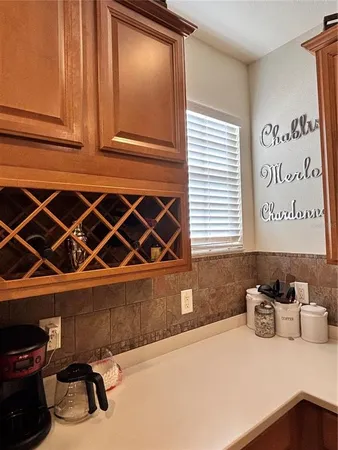 a bedroom with a bed and a table in it