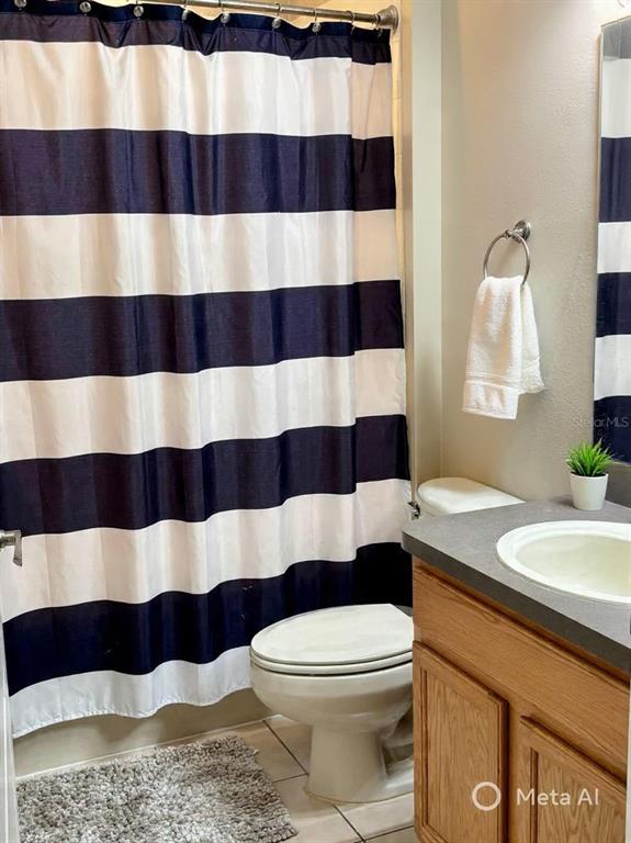 5633 Blackfin Drive New Port Richey, FL 34652 - Photo 25 of 46 a bathroom with a sink and a mirror