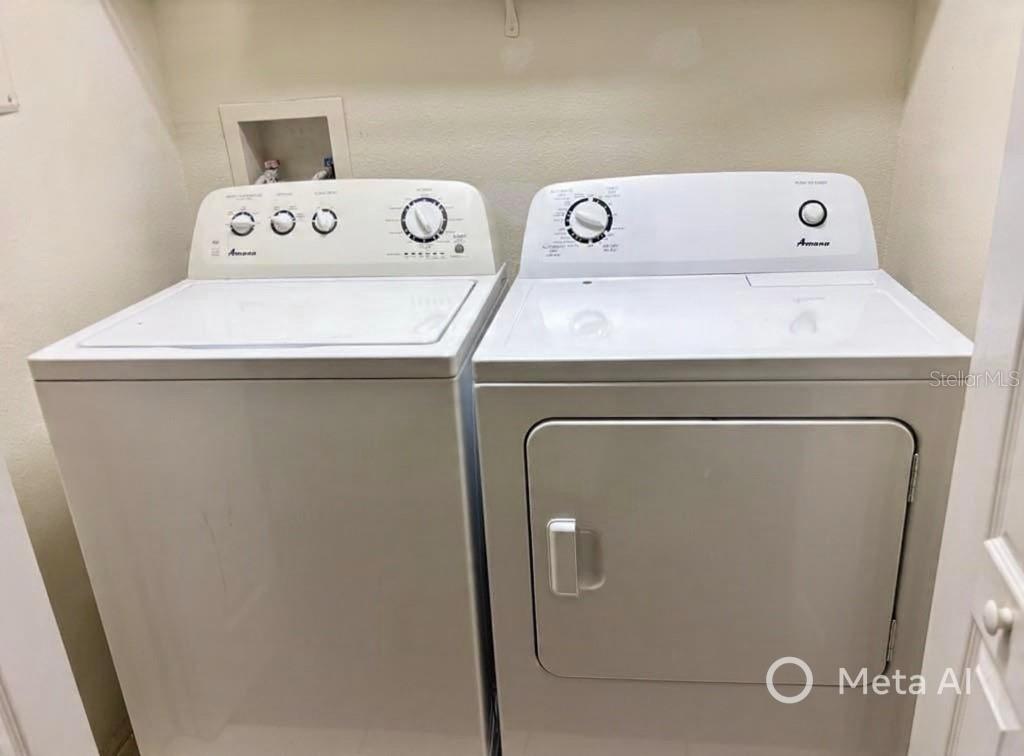 5633 Blackfin Drive New Port Richey, FL 34652 - Photo 32 of 46 a utility room with dryer and washer