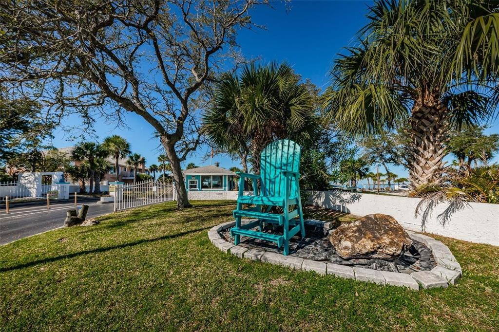 5633 Blackfin Drive New Port Richey, FL 34652 - Photo 43 of 46 a view of a garden with a tree