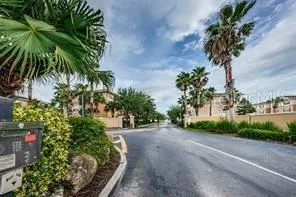a room with a sink and cabinets