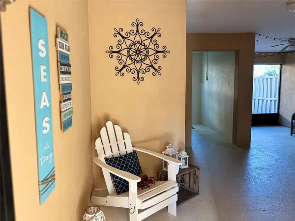 a kitchen with granite countertop a stove microwave and sink