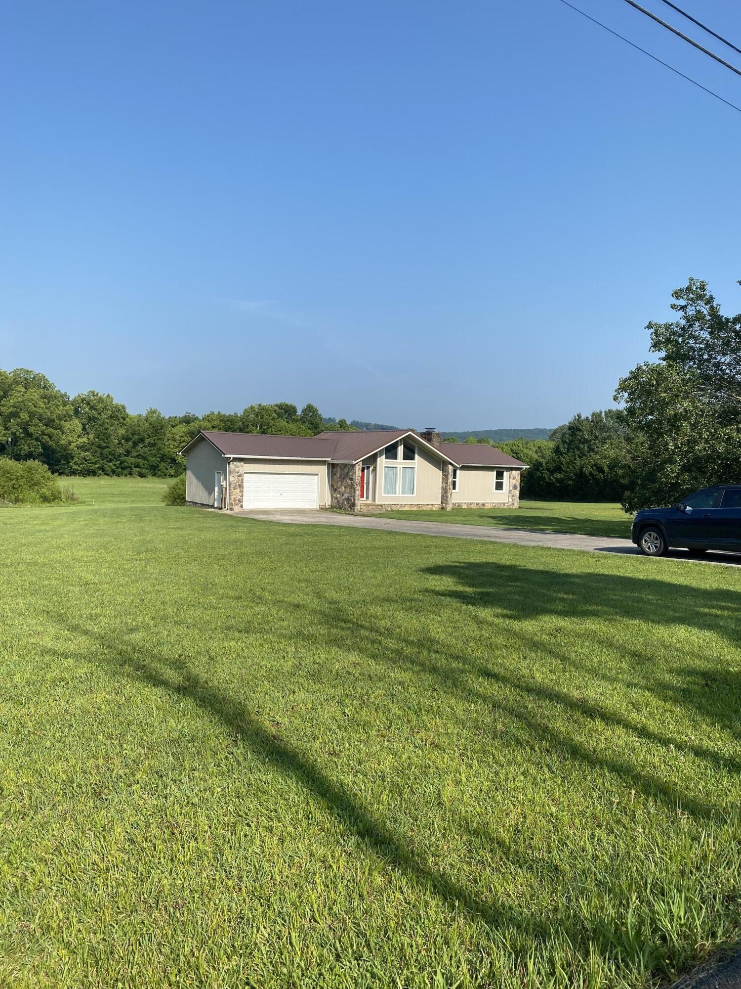 1724 Southeast Hunt Road Cleveland, TN 37323 - Photo 4 of 28 a view of a green field with clear sky