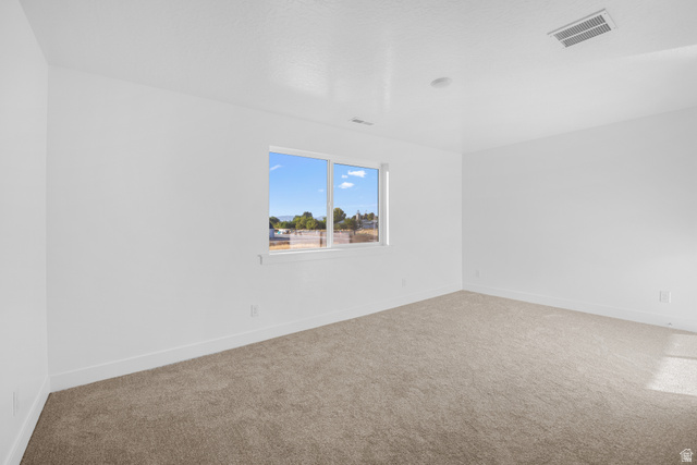 1510 West 600 North, Unit 4A Mapleton, UT 84664 - Photo 19 of 23 Spare room with carpet flooring and baseboards