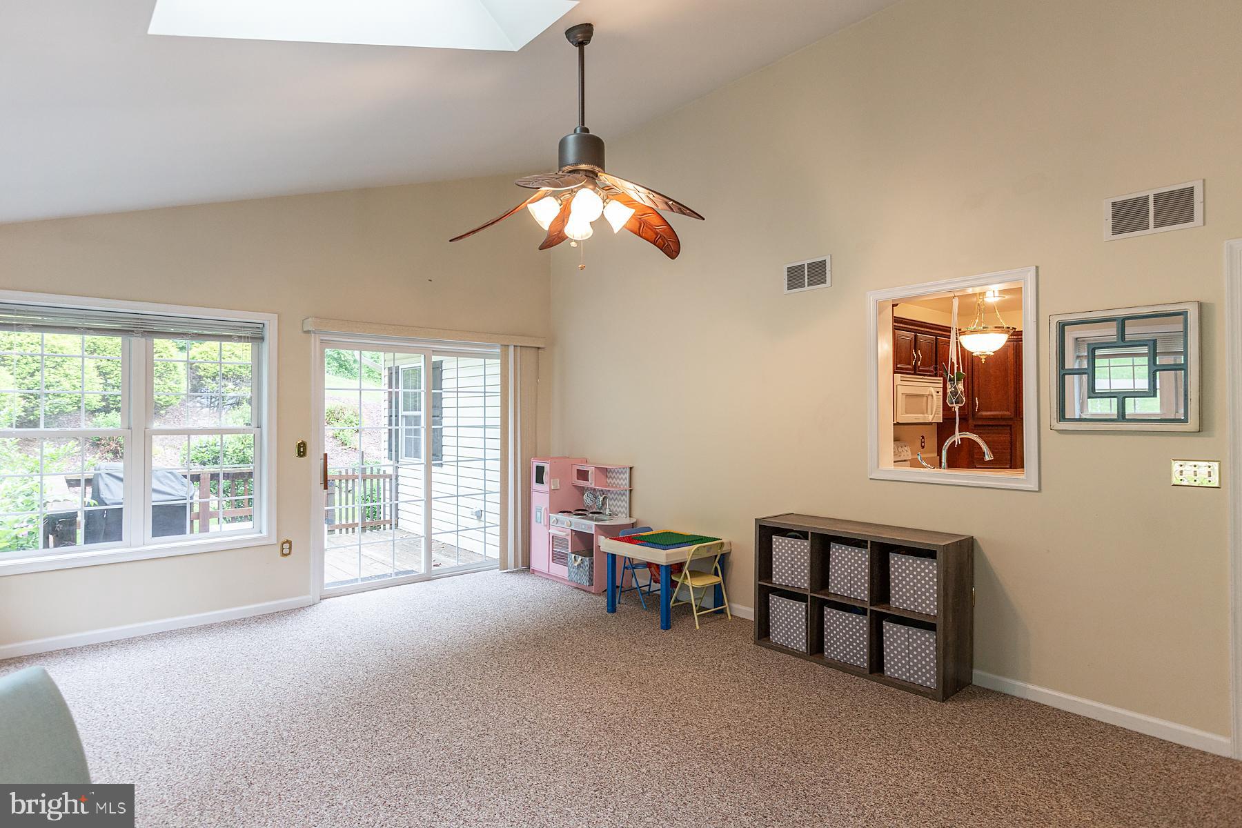 748 Old Lancaster Pike Reading, PA 19607 - Photo 47 of 118 Sunroom with skylights - sliding door to deck