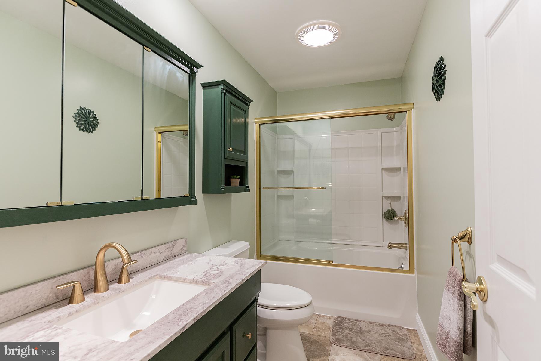 748 Old Lancaster Pike Reading, PA 19607 - Photo 64 of 118 Updated vanity - Kohler brushed gold faucet