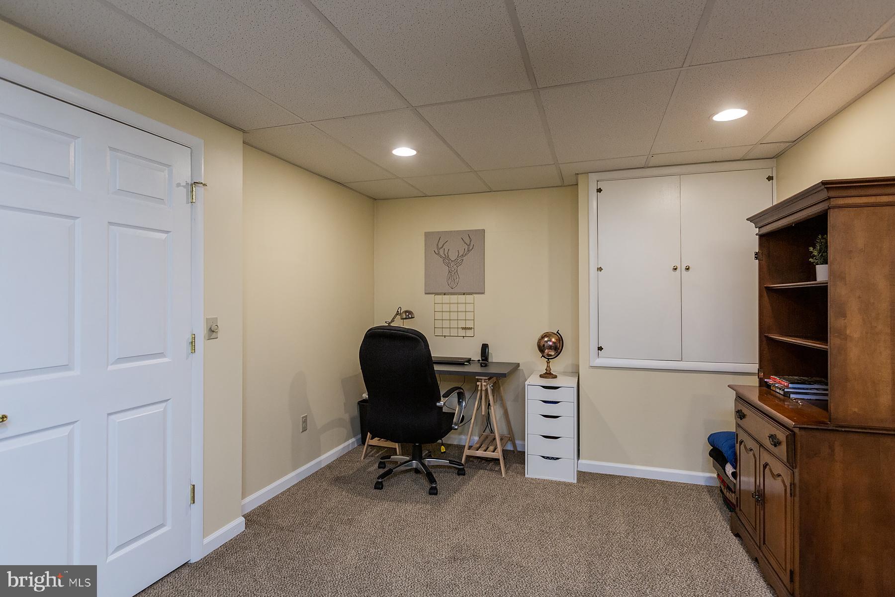 748 Old Lancaster Pike Reading, PA 19607 - Photo 72 of 118 LL Family Room - Electric box behind cabinet doors