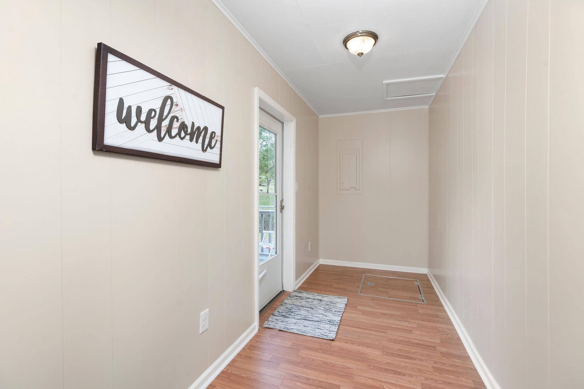 2302 Lee Highway Mount Sidney, VA 24467 - Photo 43 of 75 a view of an empty room and wooden floor