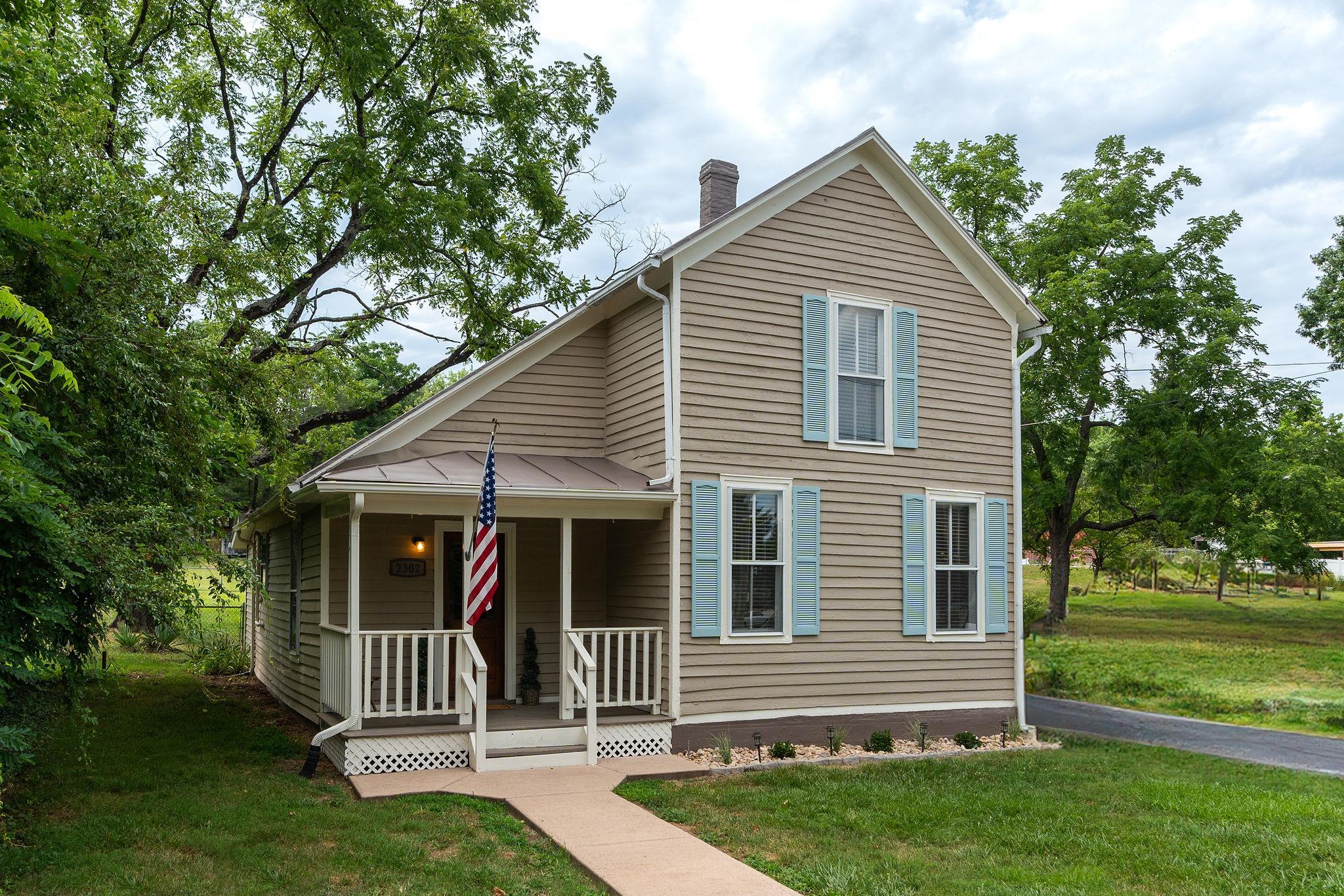 2302 Lee Highway Mount Sidney, VA 24467 - Photo 62 of 75 a view of a house with a yard and a garden