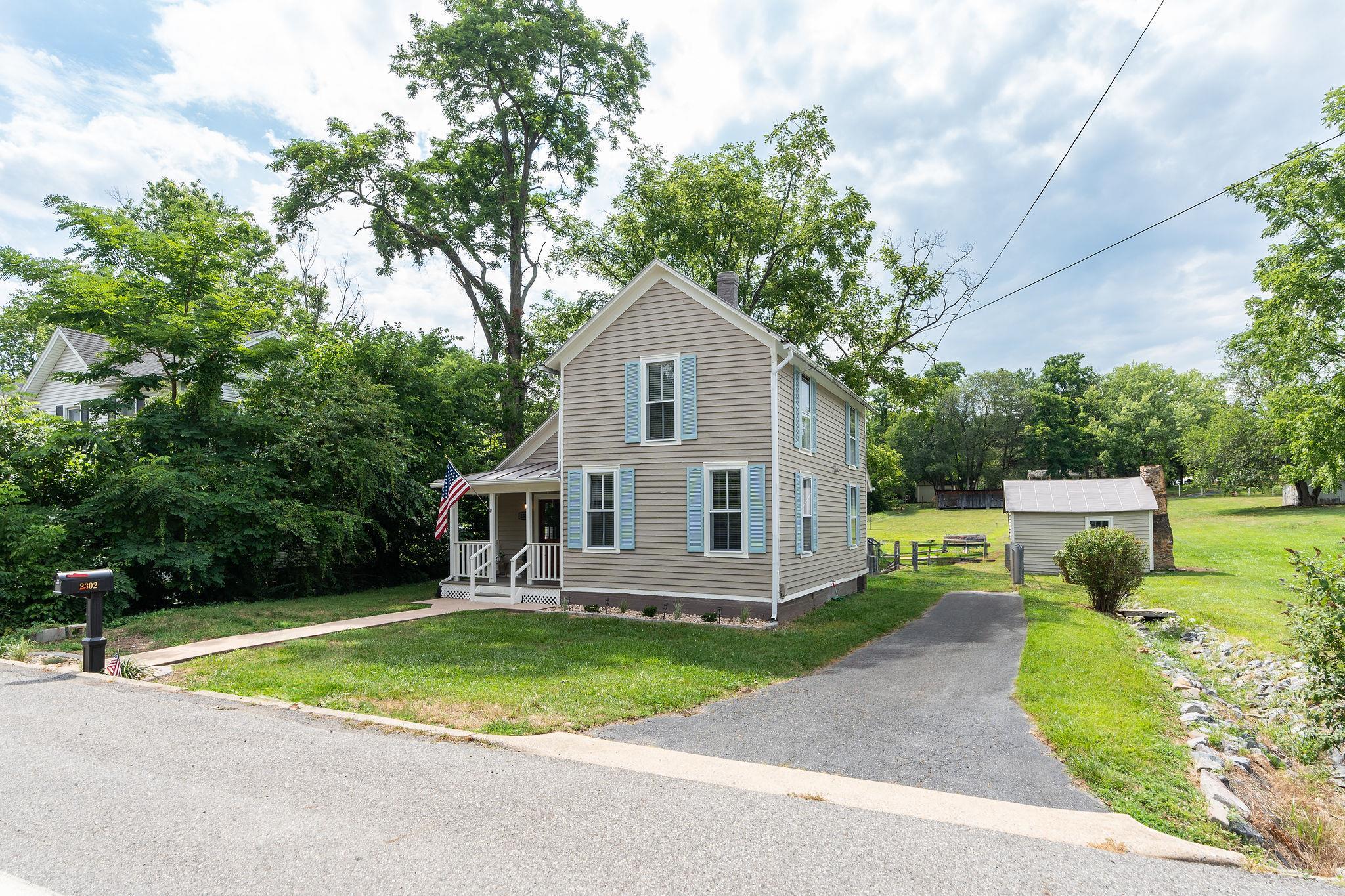 2302 Lee Highway Mount Sidney, VA 24467 - Photo 64 of 75 a view of a house with a big yard plants and large trees