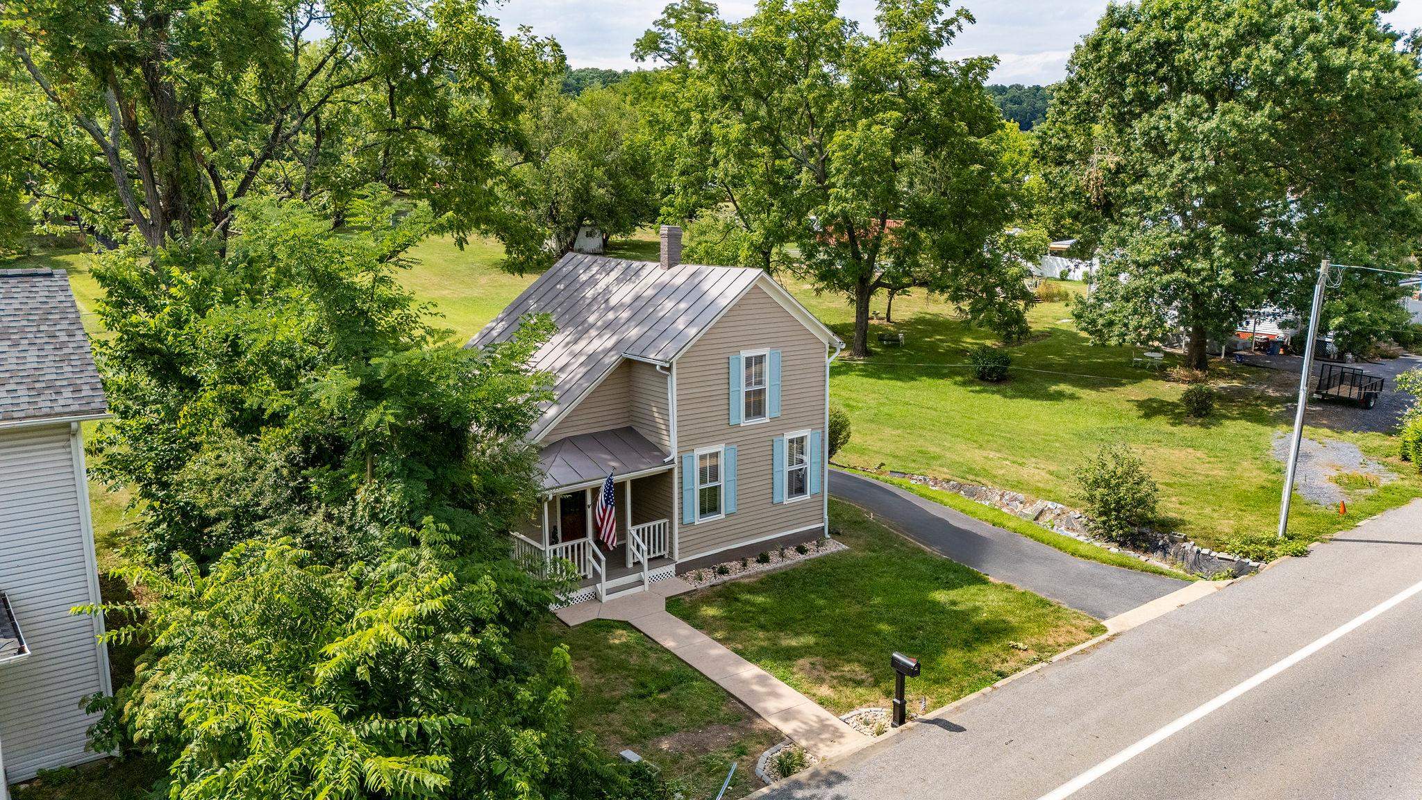2302 Lee Highway Mount Sidney, VA 24467 - Photo 66 of 75 a view of a house with pool and a yard