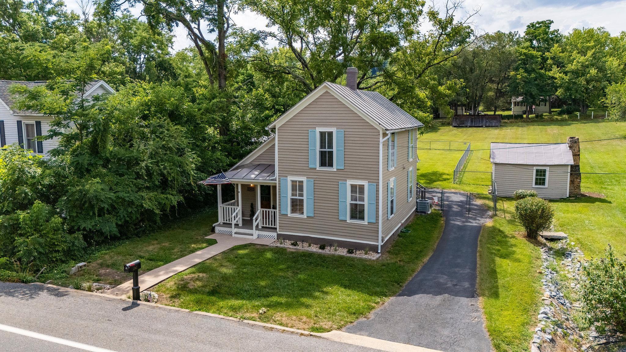 2302 Lee Highway Mount Sidney, VA 24467 - Photo 67 of 75 a front view of a house with a yard