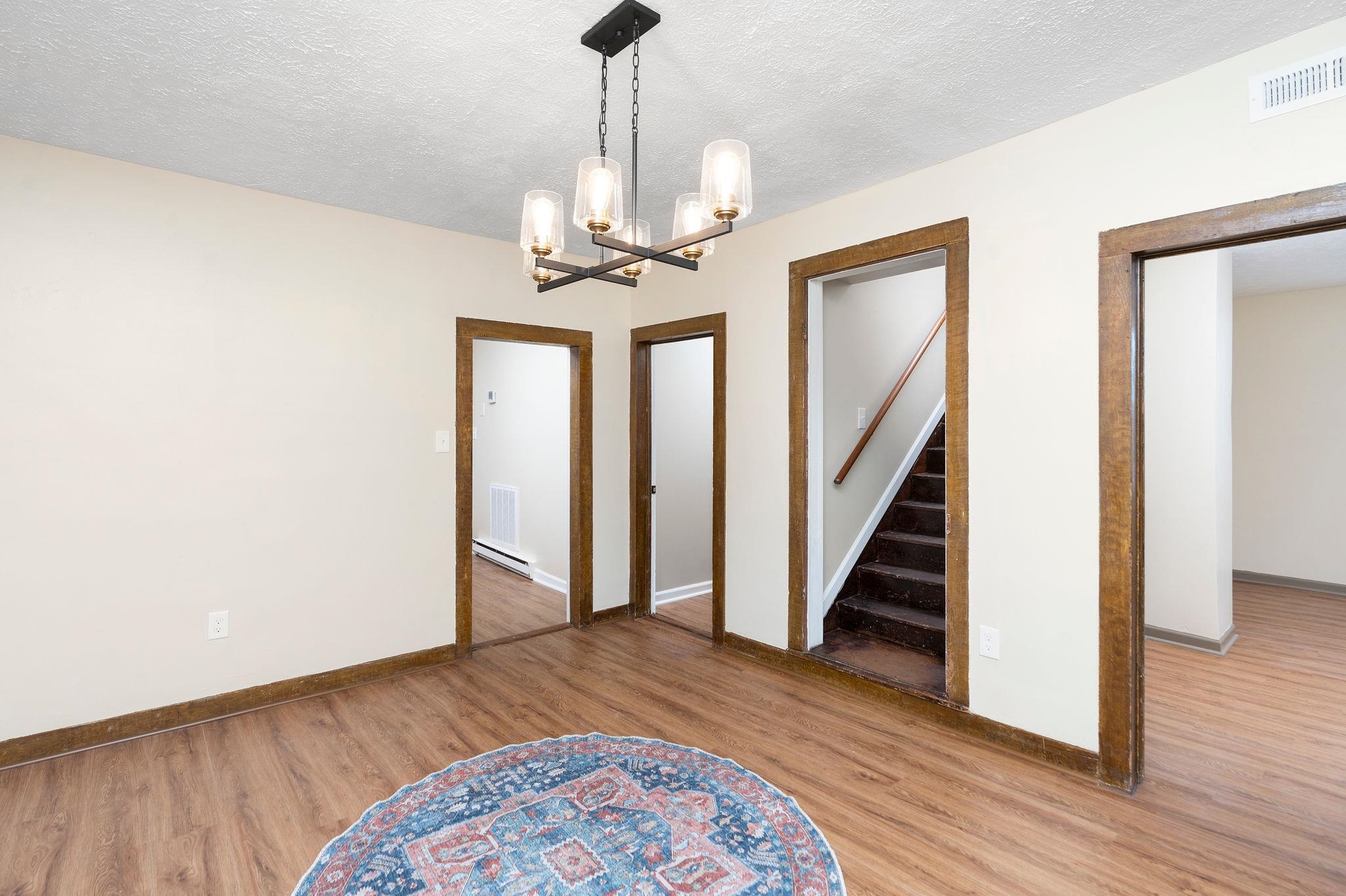 2302 Lee Highway Mount Sidney, VA 24467 - Photo 8 of 75 a view of a hallway with wooden floor and staircase