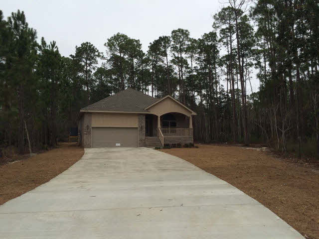 4640 Spinnaker Way Orange Beach, AL 36561 - Photo 2 of 25 front yard