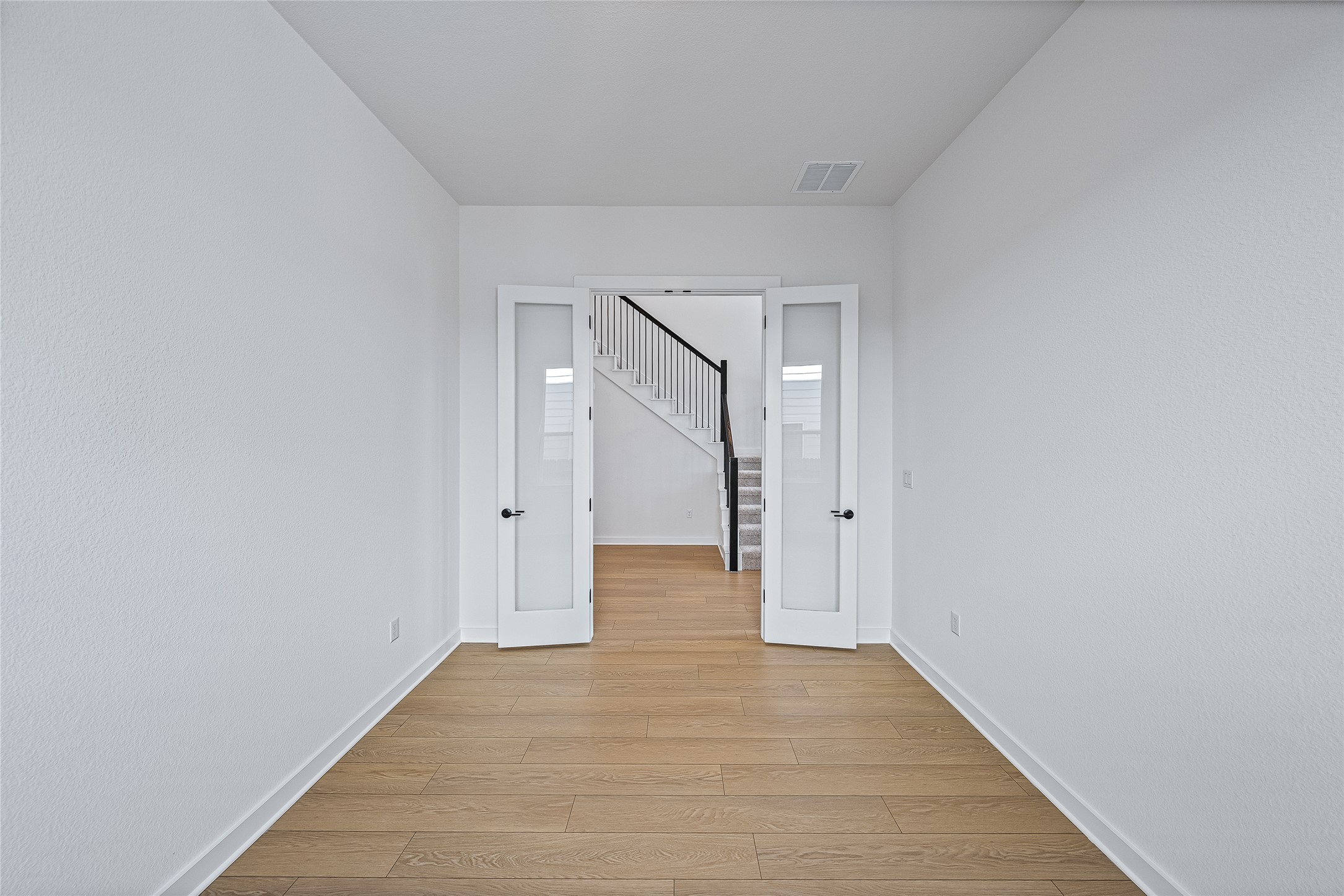 6812 Rounded Pebble Lane Buda, TX 78610 - Photo 28 of 40 a view of an empty room