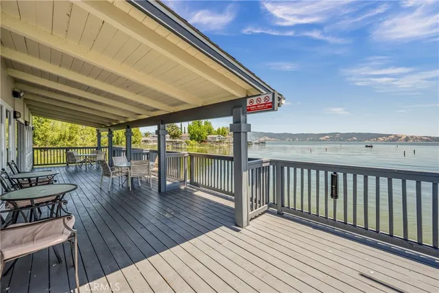 a view of outdoor space with wooden floor and iron stairs