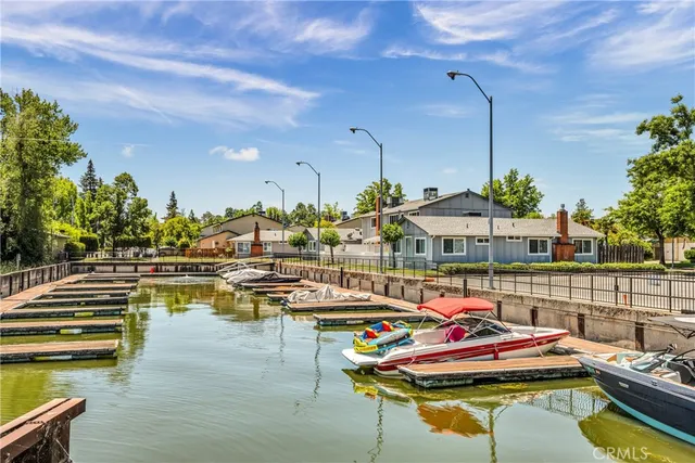 a view of swimming pool with outdoor seating