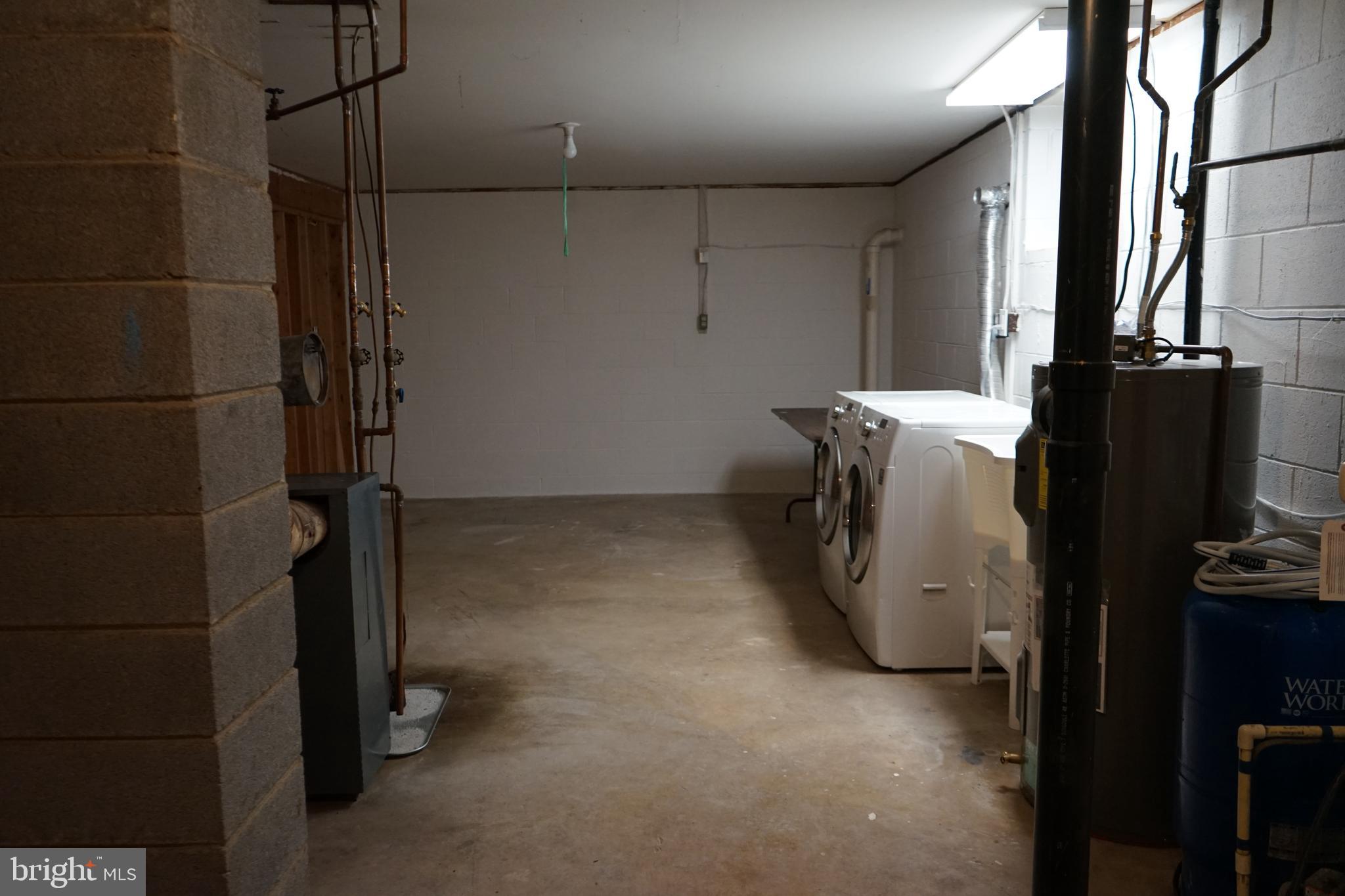 9509 Lees Mill Road Warrenton, VA 20186 - Photo 14 of 17 Basement Laundry and Storage