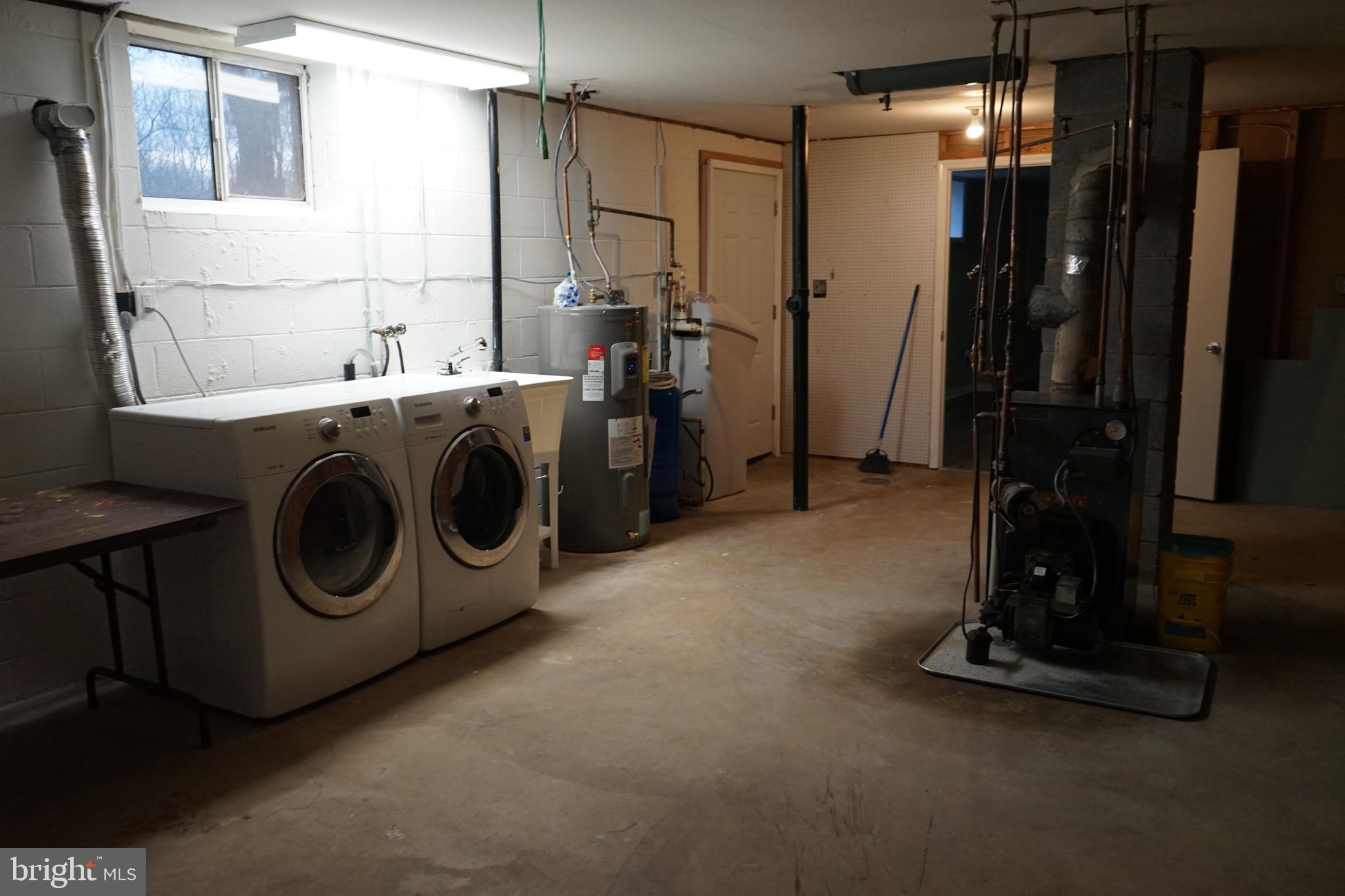 9509 Lees Mill Road Warrenton, VA 20186 - Photo 15 of 17 Basement Laundry and Storage