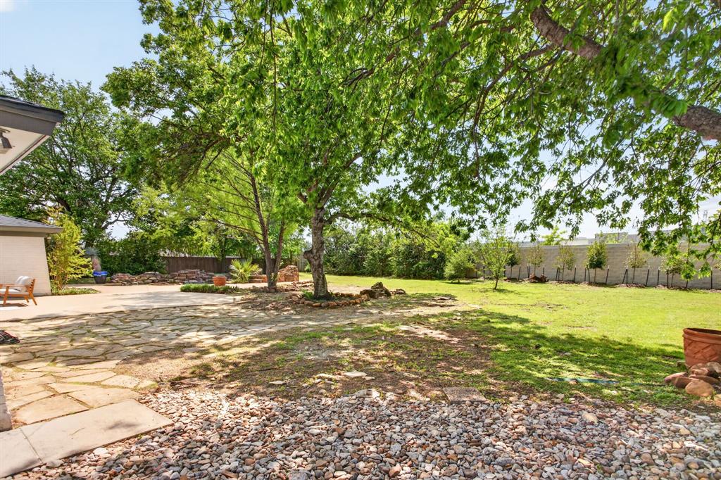 4316 Winding Way Benbrook, TX 76126 - Photo 34 of 40 a view of a yard with a tree