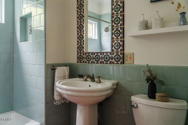 a bathroom with a sink and a toilet