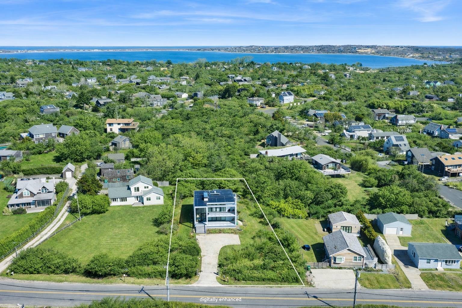 15 Deforest Road Montauk, NY 11954 - Photo 20 of 22 an aerial view of a house with a yard