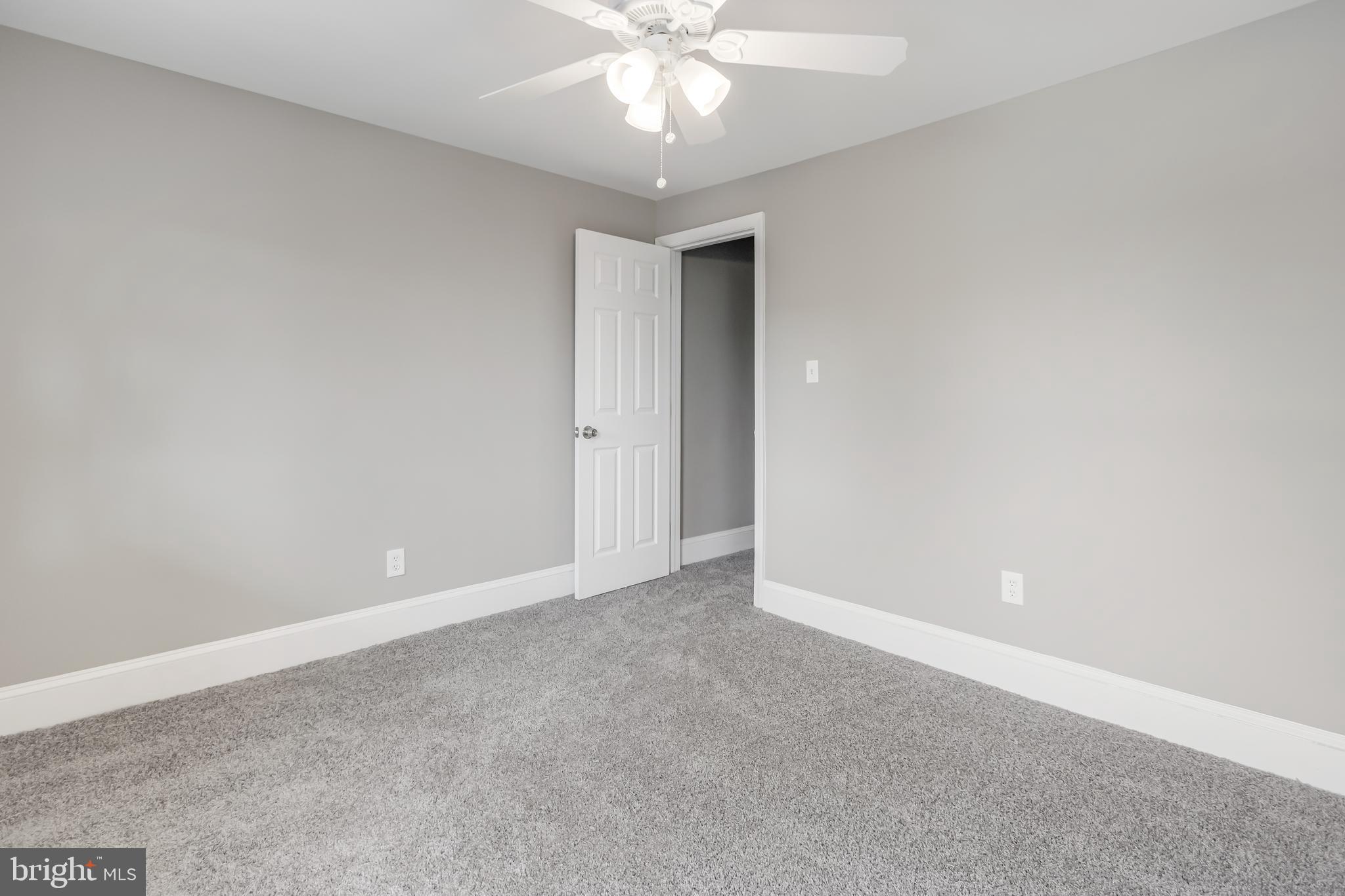 2817 Winchester Street Baltimore, MD 21216 - Photo 24 of 29 a view of an empty room with a window