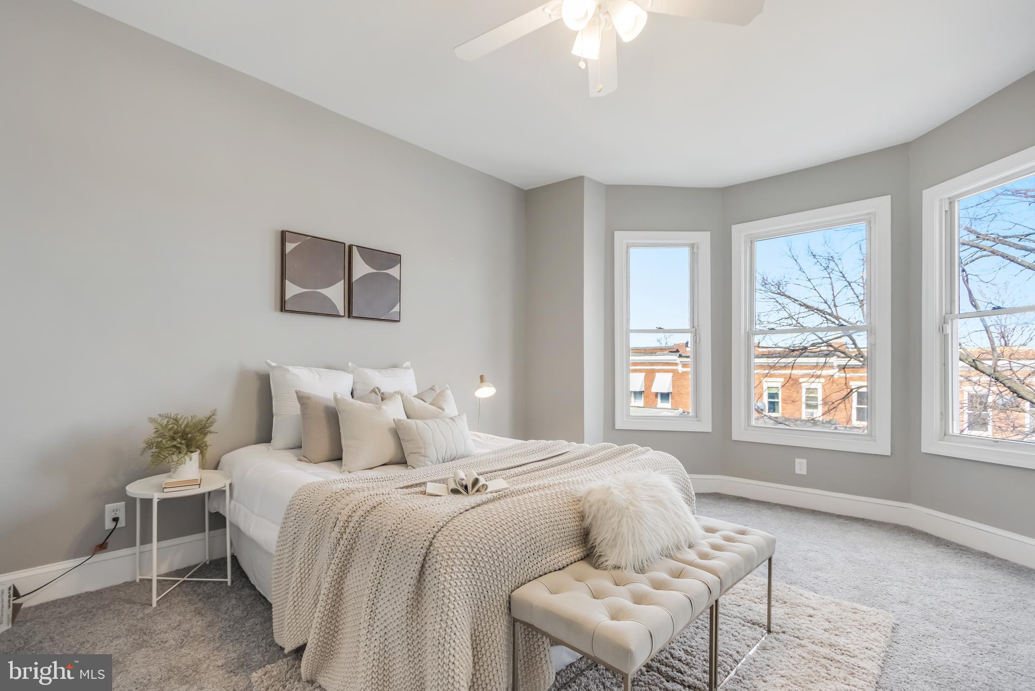 2817 Winchester Street Baltimore, MD 21216 - Photo 25 of 29 a bedroom with a bed and a window